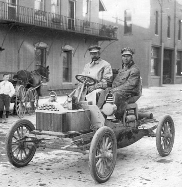 Buicks chief engineer, Walter L. Marr (left), and Thomas D Buick, son of founder David Dunbar Buick, in the first Flint Buick as it ended its successful Flint-Detroit round trip in July, 1904.